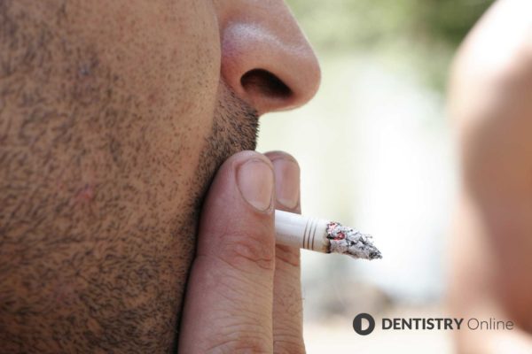A top cancer surgeon has urged people with mouth ulcers and neck lumps to get their symptoms checked
