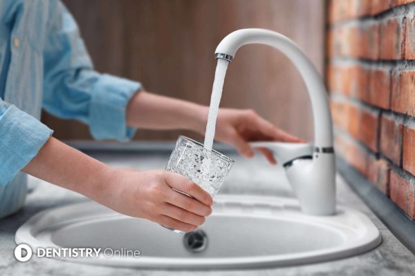 Water fluoridation and a collaborated healthcare approach is key to tackling child oral health in the face of COVID-19
